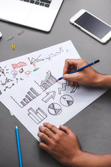 Business concept. Businessman writing idea sketch