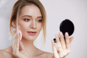 Woman Beauty Face. Female Applying Makeup