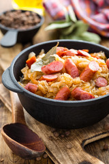 Cabbage braised with sausages, sauerkraut. German cuisine.