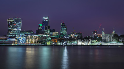 Fototapeta na wymiar The City of London and the Tower at night