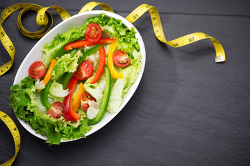Healthy fitness meal with fresh salad. Diet concept.