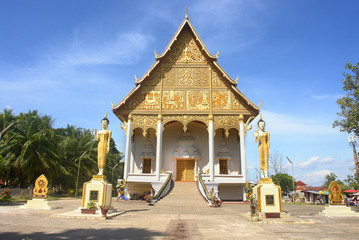 Buddhist  temple  Pha That Luang with Lying Buddha  in Vientiane in Laos.
