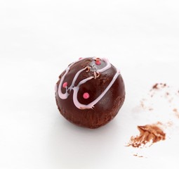 homemade chocolate bonbons closeup on white