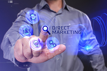 Business, Technology, Internet and network concept. Young businessman working on a virtual screen of the future and sees the inscription: Direct marketing