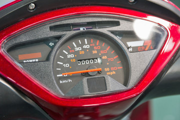 Dashboard with speedometer of electric motorcycle closeup