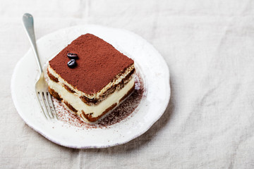 Tiramisu, traditional Italian dessert on a plate