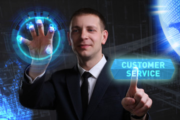 Business, Technology, Internet and network concept. Young businessman working on a virtual screen of the future and sees the inscription: Customer service