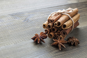 fresh cinnamon with star anise on wooden table