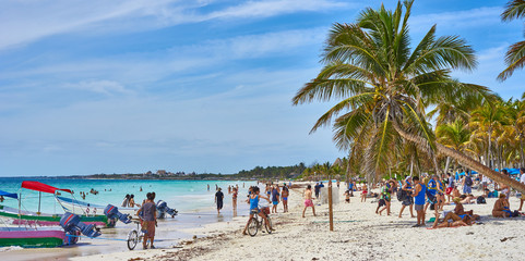 Caribbean coast of Riviera Maya / Tourists at so called "Paradise Beach" next to Tulum and Playa del Carmen in Mexico