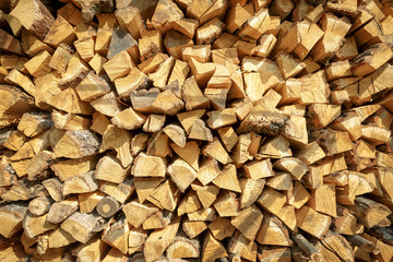 Chopped dry firewood stock background and texture.