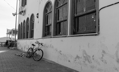 Black and white photo of bicycle at teh street of Cunda Island, Ayvalik, Balikesir, Turkey
