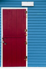 Brightly colored wooden door and wall