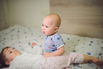 Boy Playing with Sister
