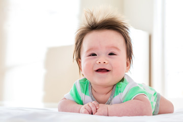 Happy baby boy smiling