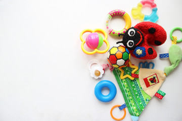Children's toys and accessorieson a White background.view from above