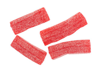 Strawberry flavored gummy sweet and sour candy isolated on a white background.