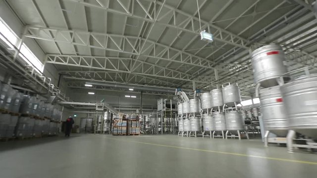 Warehouse With Metal Barrels