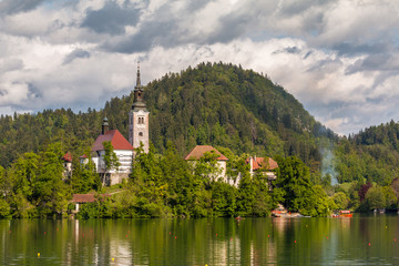 Fototapeta na wymiar The most beautifully situated church in Slovenia, Blejski Otok, Bled, Slovenia 