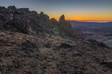 Fototapeta premium Teide volcano in Tenerife, volcanic rocks in the red light of the rising sun