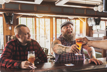 Men in a pub drinking beer