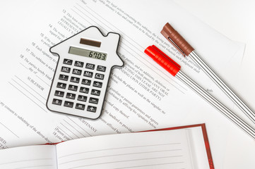 Calculator and contract - seal, purchase and investment