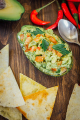 Avocado boat - guacamole dip in boat made from avocado skin.