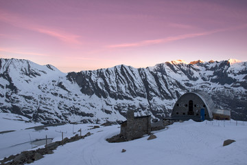 Il sole nascente ,illumina con magici colori le montagne che contornano il rifugio Vittorio...