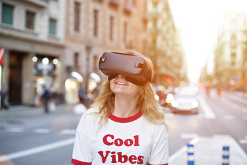 Cute hipster can not believe her eyes while experiencing augmented reality googles for the first...
