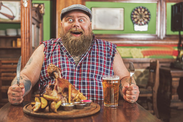 Astonished man looking at camera with joy