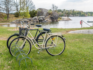 Fototapeta premium Bikes in front of Stockholm Archipelago beach, Sweden