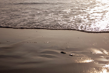 sand beach background with waves