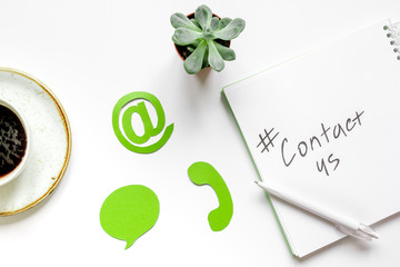 client support service workdesk with contact us signs white background top view