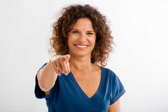 Happy Mature Woman Pointing