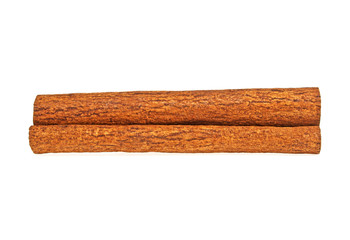 One cinnamon stick on a white background, top view