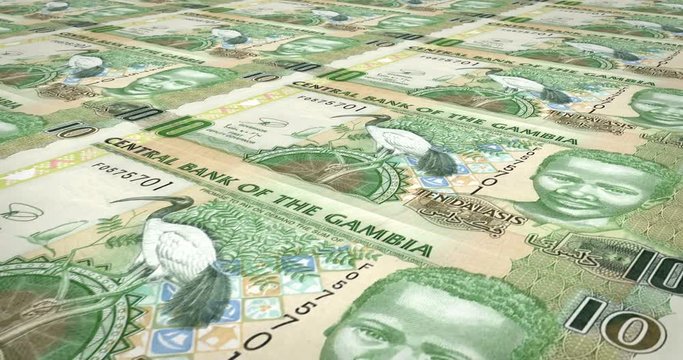 Banknotes of ten gambian dalasis of Gambia rolling, cash money, loop