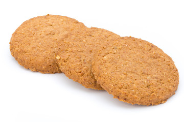 Stacked short pastry cookies isolated on white background.