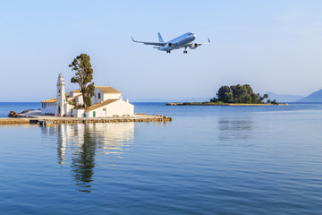 Plane landing over the Vlacherna Monastery in Kerkyra in Corfu, Greece - 155175829