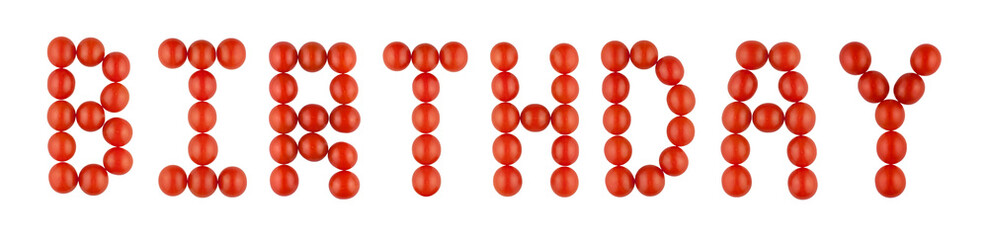 The word BIRTHDAY made from red tomatoes on the white background