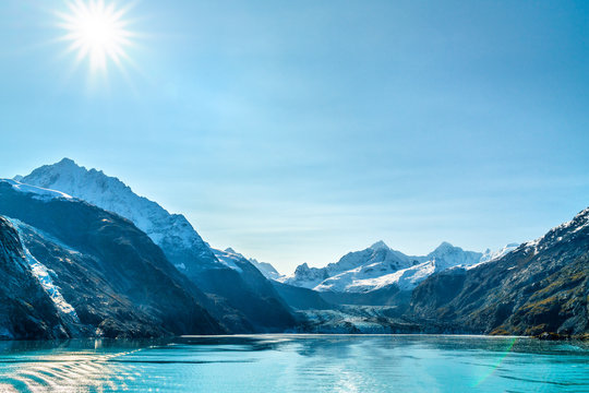 Alaska Cruise Travel Landscape. Glacier Bay Johns Hopkins Glacier On Sunny Day With Sun Flare. Summer Vacation In Alaska, USA.