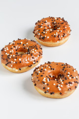 Lovely donuts on white background