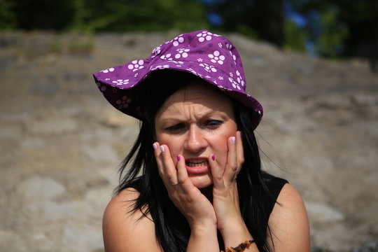 The beautiful  girl in a hat