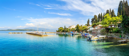 Boats in port Kouloura in Corfu, Greece - obrazy, fototapety, plakaty