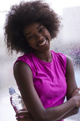 portrait of young afro american woman in gym