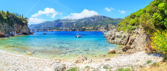 A panorama of Prto Timoni beach in Corfu, Greece