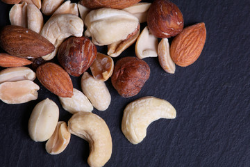 Nuts mix on black background. Close up