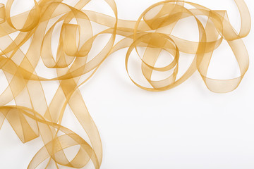 Golden coloured sheer ribbon arrangement