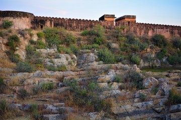 A view of dried up pond with rock formation in ancient Amber Fort of Jaipur, Rajasthan, India