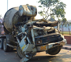 A broken cement mixer truck after an accident  - Powered by Adobe