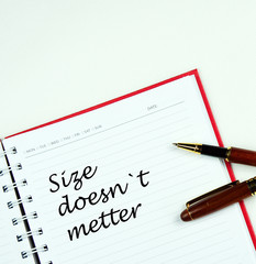 Communication message motivation concept with " size doesnt metter " word on notebook.