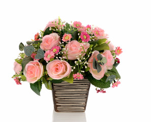 Bouquet of pink roses in a vase on white background